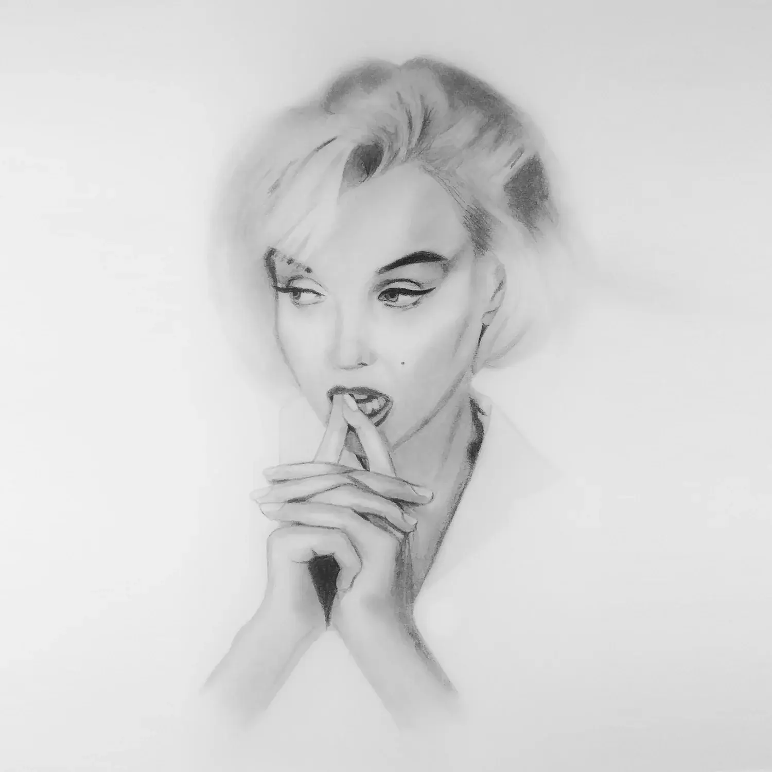 Portrait of Marilyn Monroe, a finger to her lips.